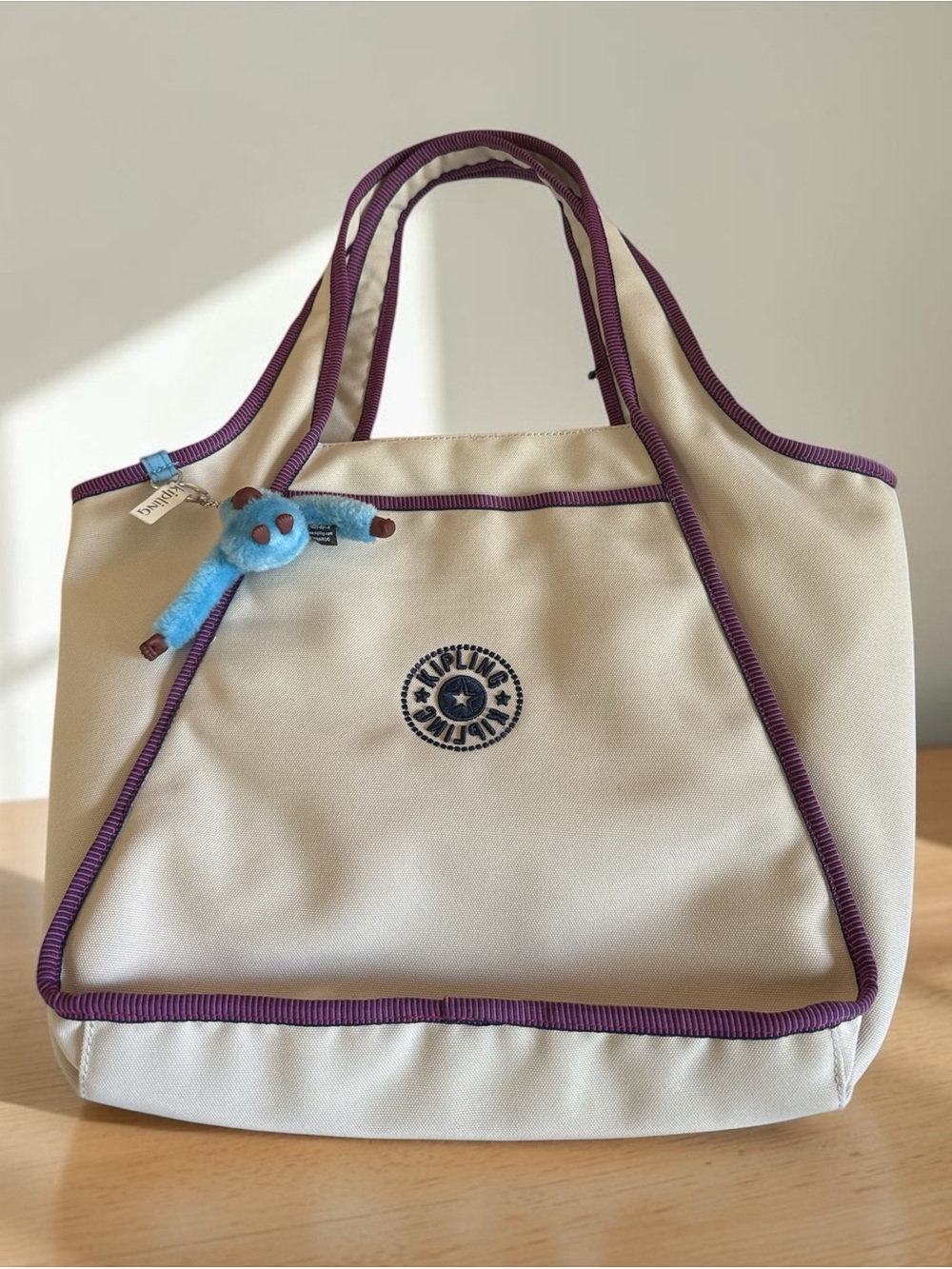 Kipling NWT Ivory Canvas Tote Bag Purple Trim Zip Pockets